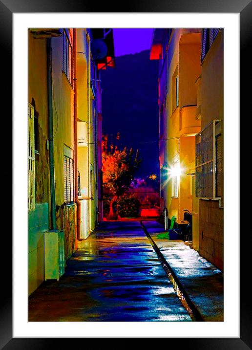an alley at nightime Framed Mounted Print by ken biggs