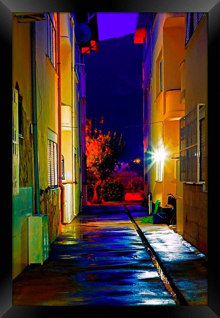 an alley at nightime Framed Print by ken biggs