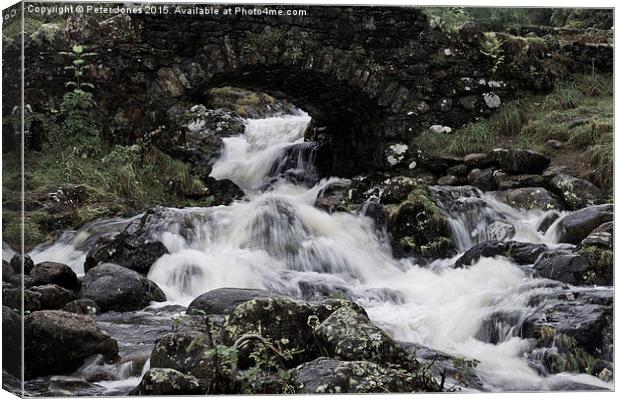  Ashness Bridge upstream Canvas Print by Peter Jones