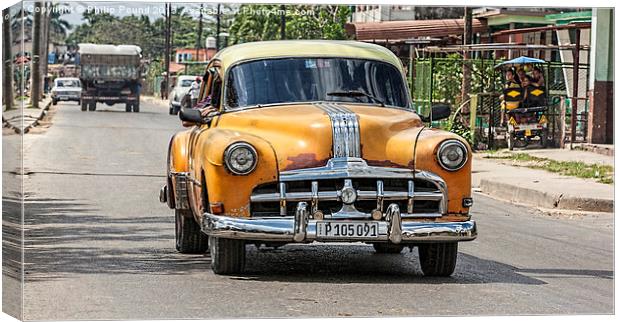  Very old yellow American car in Cuba Canvas Print by Philip Pound