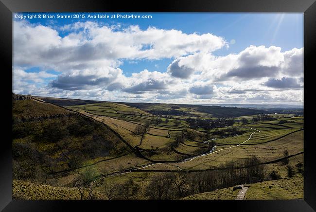  View over the dale to Malham from Malham Cove Framed Print by Brian Garner