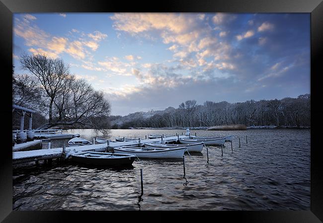 Rowing boats in Snow Framed Print by Stephen Mole