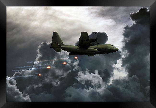 C-130 Popping Flares  Framed Print by J Biggadike