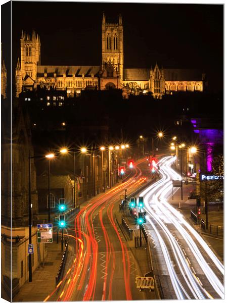  Lincoln Cathedral and light trail Canvas Print by Andrew Scott