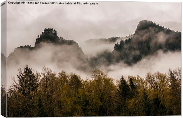 Mist covered Mountains  Canvas Print by Hans Franchesco