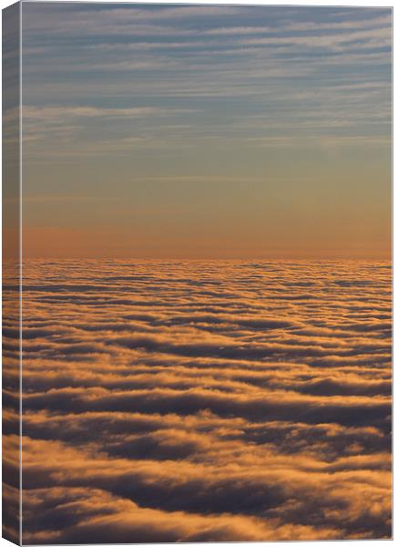 Dawn sky above the clouds Canvas Print by HELEN PARKER