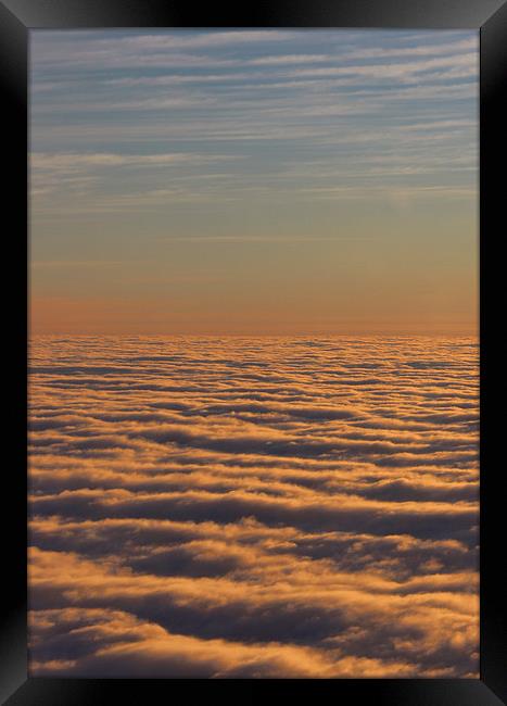 Dawn sky above the clouds Framed Print by HELEN PARKER
