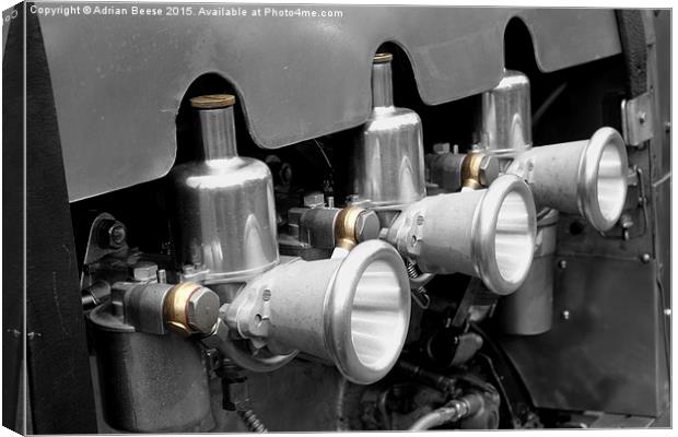 Split toned photograph of triple S.U Carburettors  Canvas Print by Adrian Beese