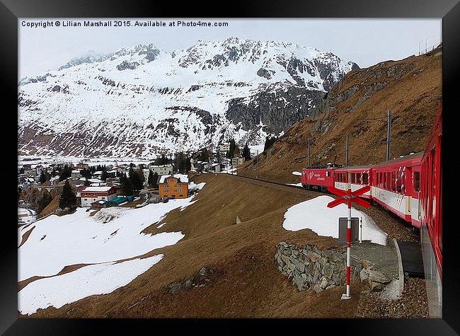  Train down from the Oberalp Pass. Framed Print by Lilian Marshall