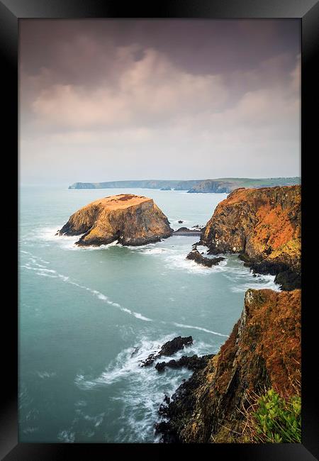 Storm Clouds over Ynys-fach Framed Print by Andrew Ray