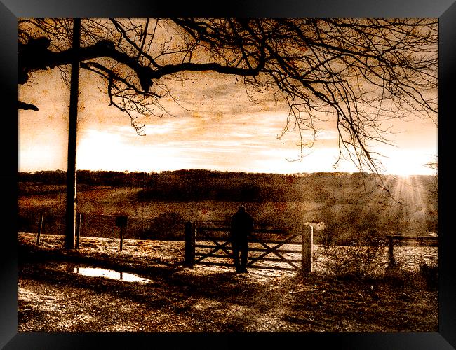  Watching the sun go down Framed Print by Kim Slater