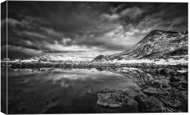 Where The Mountain Meets The Fjord Canvas Print by Nigel Jones