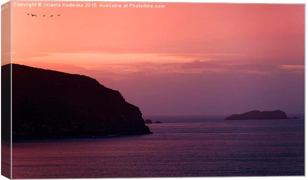 Sunset over the coast  Canvas Print by Jolanta Kostecka