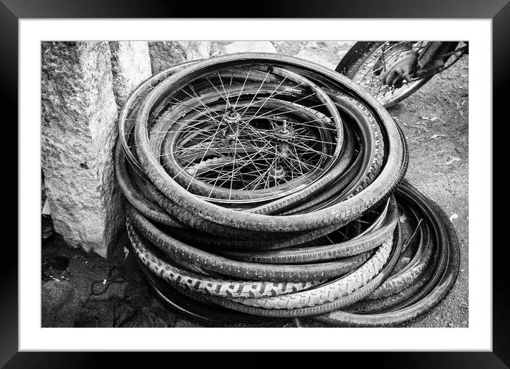 old bicycle tires and wheels Framed Mounted Print by Brent Olson