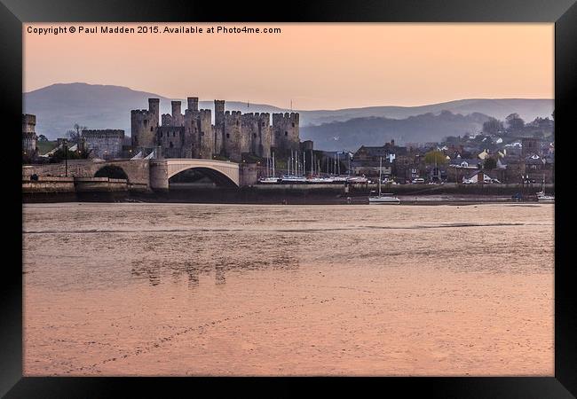 Conwy Castle and harbour at dusk Framed Print by Paul Madden