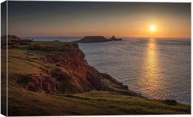  Sunset at Worms head rhossili bay Canvas Print by Leighton Collins