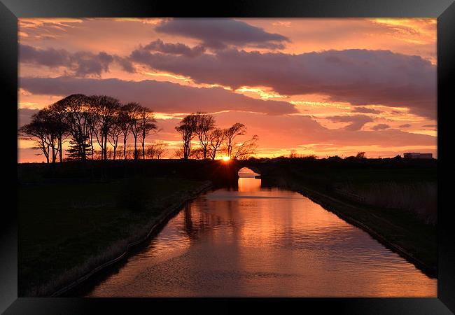  Sunset  And Silhouettes On The Canal  Framed Print by Gary Kenyon
