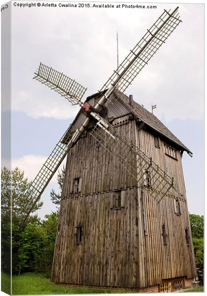 old wood windmill with sails in Poland  Canvas Print by Arletta Cwalina