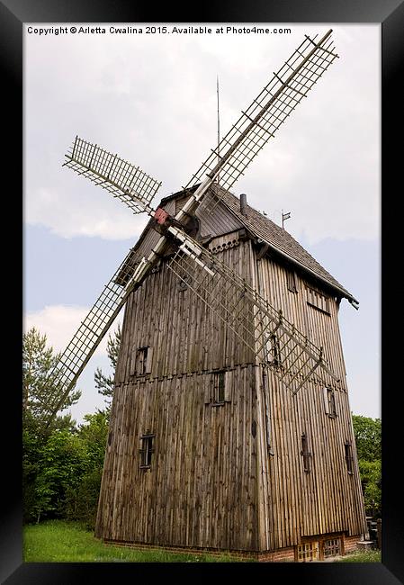 old wood windmill with sails in Poland  Framed Print by Arletta Cwalina