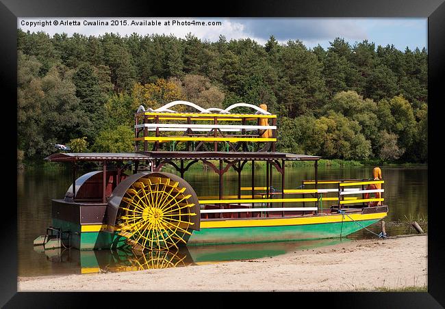 Sternwheeler moored on river strand attraction  Framed Print by Arletta Cwalina