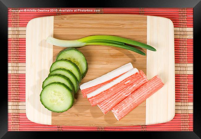 Crab sticks of surimi and cucumber with chives  Framed Print by Arletta Cwalina