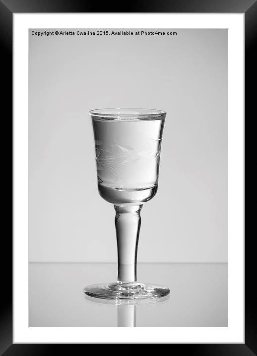 One stem glass of clear vodka Framed Mounted Print by Arletta Cwalina
