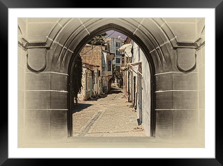 village street through arched doors  Framed Mounted Print by ken biggs