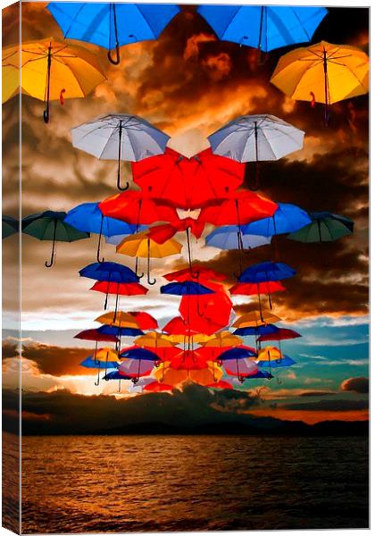 colorful umbrellas against a stormy sky Canvas Print by ken biggs