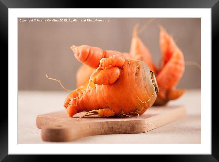 raw deformed carrot roots  Framed Mounted Print by Arletta Cwalina