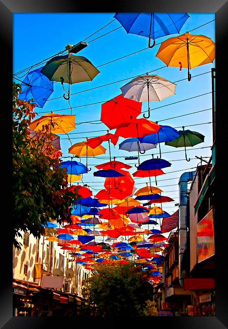 colorful umbrellas in Kaleici Antalya Turkey Framed Print by ken biggs