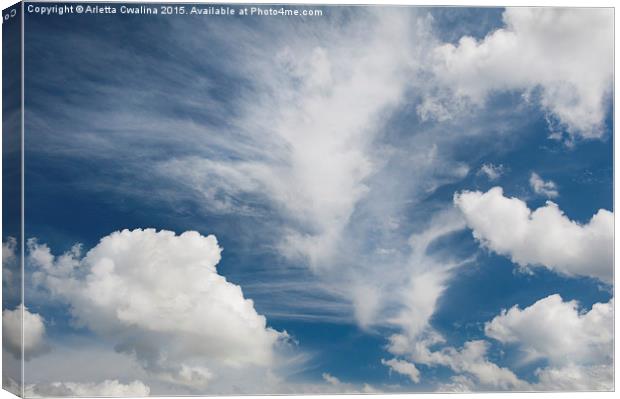 White various clouds formation Canvas Print by Arletta Cwalina