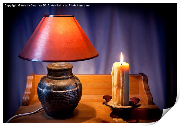 electrical night light lamp and burning candle  Print by Arletta Cwalina