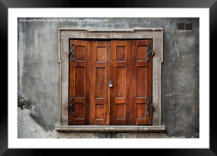 Old wooden shutters close window Framed Mounted Print by Arletta Cwalina
