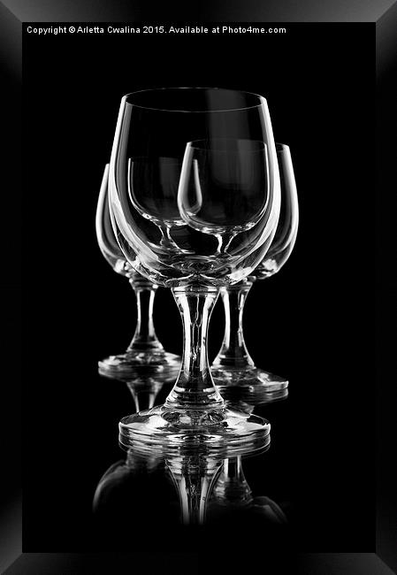 Three empty wine glasses on black Framed Print by Arletta Cwalina
