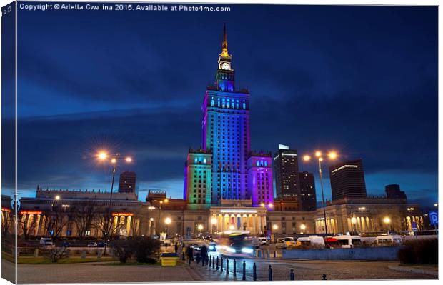 Rainbow colors on PKiN building in Warsaw, Poland Canvas Print by Arletta Cwalina