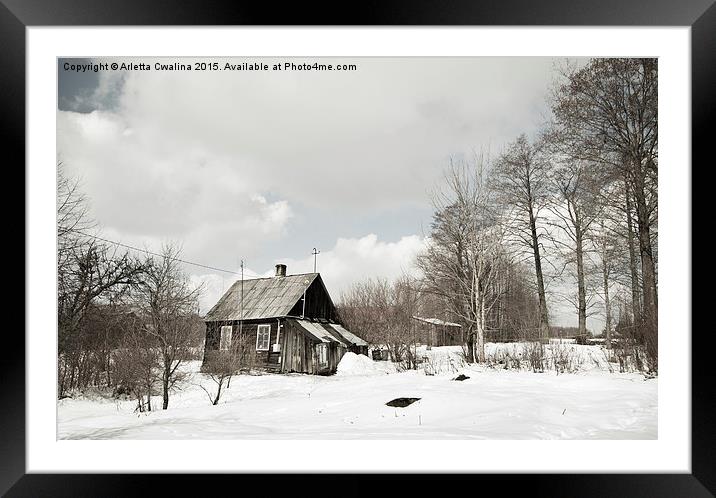 dilapidated wooden house in winter Framed Mounted Print by Arletta Cwalina