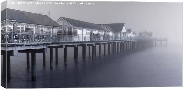 Southwold Pier vanishing into the mist Canvas Print by Karen Magee