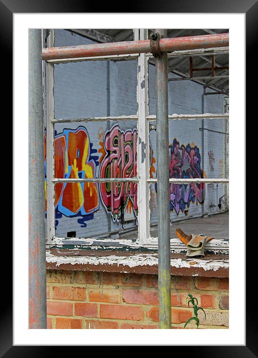  Grafitti through Window Framed Mounted Print by Tony Murtagh