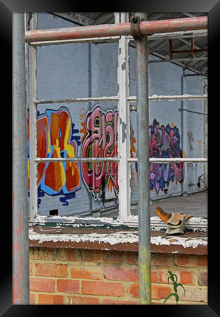  Grafitti through Window Framed Print by Tony Murtagh
