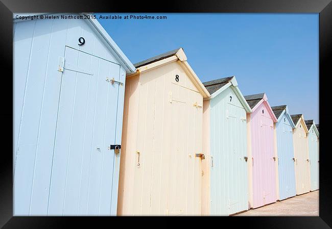  Line of Pastel Coloured Beach Huts Framed Print by Helen Northcott