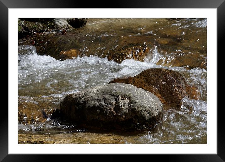whirling water over boulders near Rasinari Framed Mounted Print by Adrian Bud