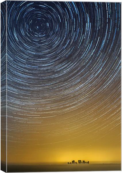  Star Trails above a misty Stonehenge Canvas Print by stuart bennett