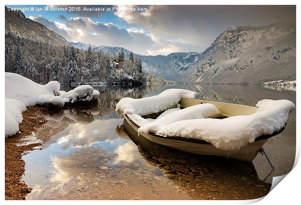 Snow covered boat on Lake Bohinj in Winter Print by Ian Middleton
