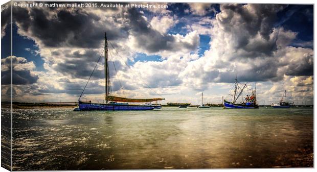  Moored Boats at West Mersea in Spring Weather Canvas Print by matthew  mallett