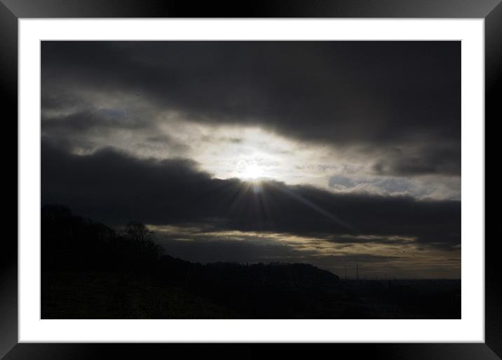 Sun Breaking Through the Clouds Framed Mounted Print by David Moate