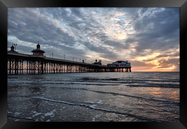 Sunset Sky Over North Pier Framed Print by Gary Kenyon