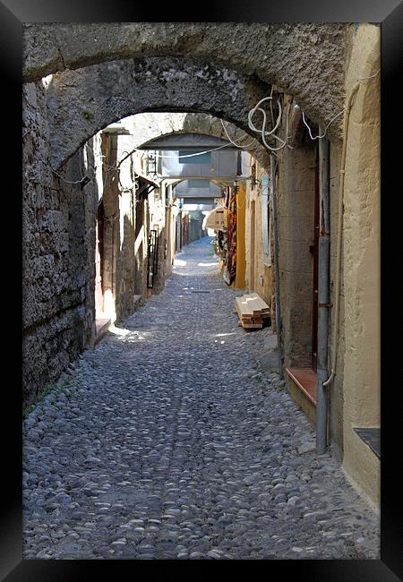  cobbled streets of rhodes Framed Print by mark philpott