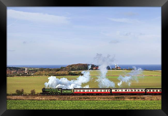 Steam train passing Weybourne.  Framed Print by Ian Duffield
