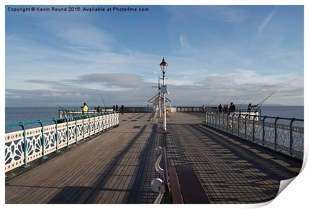 People fishing on Penarth Pier, Wales, UK Print by Kevin Round