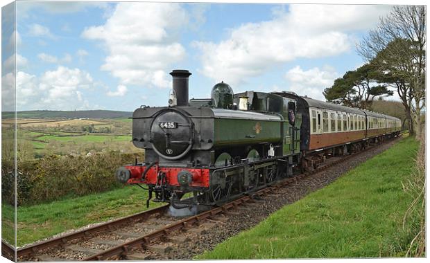  Steam train through the countryside Canvas Print by Ashley Jackson
